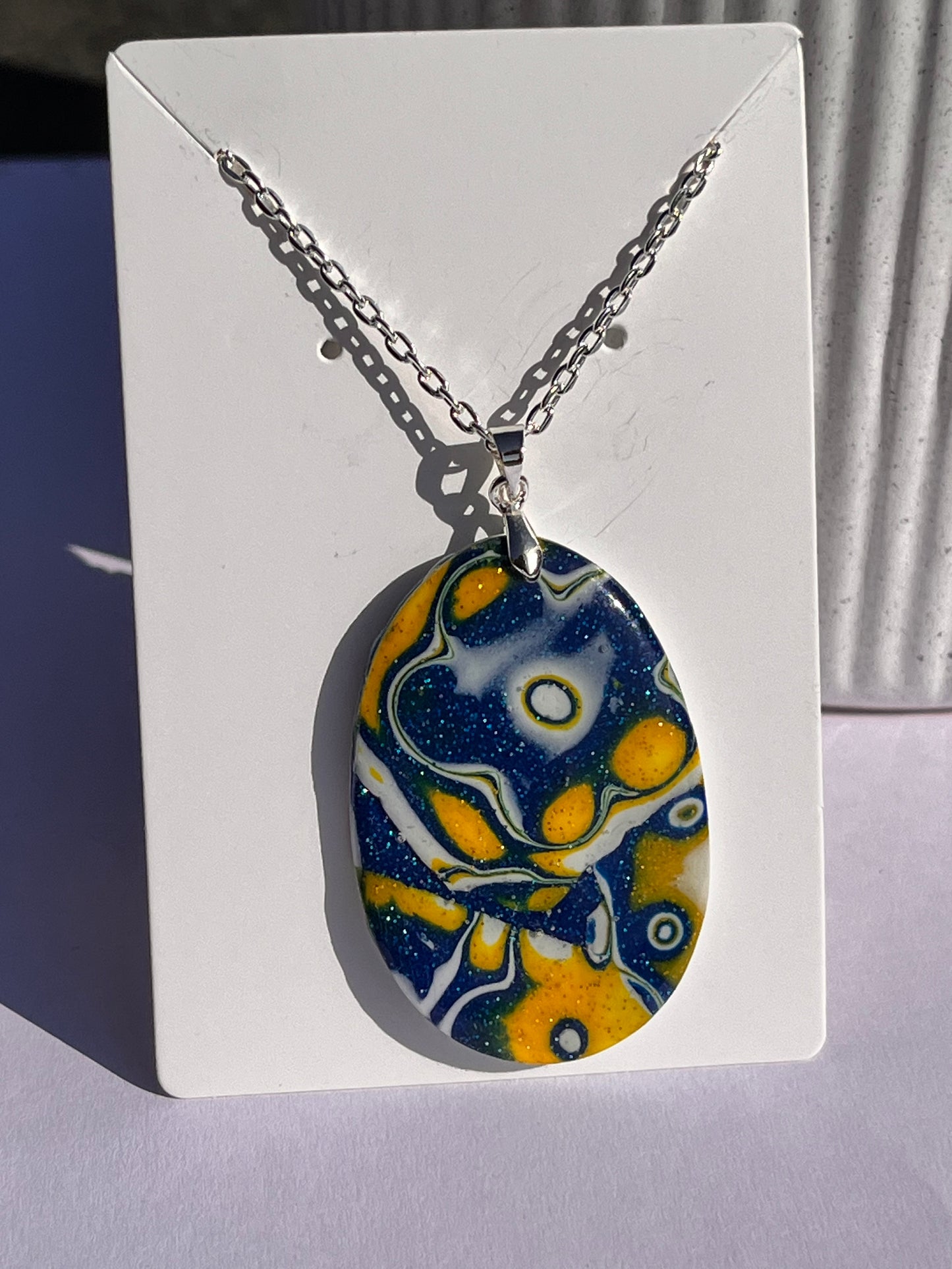 Night and Day Oval Pendant