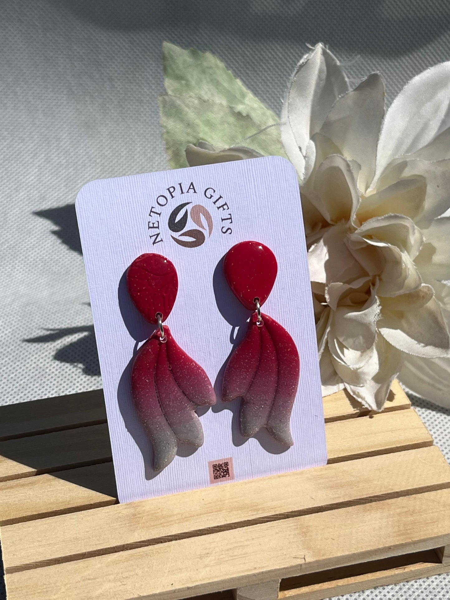 Ruby red/silver feather dangle earrings